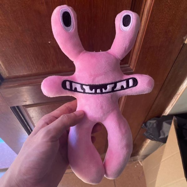 Rosaögd monster plyschleksak mjuk fylld docka lämplig för åldrar från tre år och uppåt