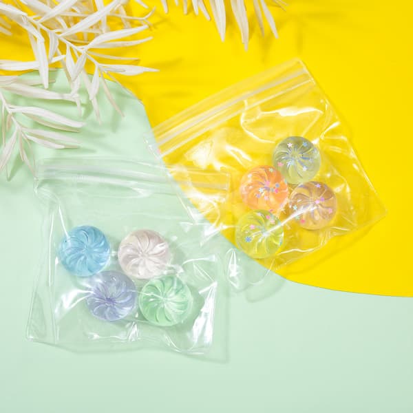 4 kpl Glitterpullaa Squishy-leluja – Kristallipuristuslelu stressin lievitykseen b