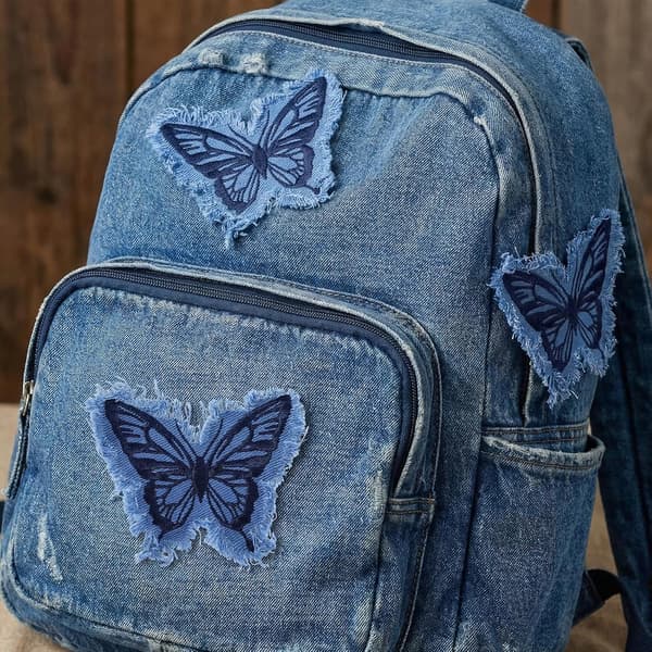 6 stk. sommerfugl-strykemerker i denim, blå brodert applikasjon