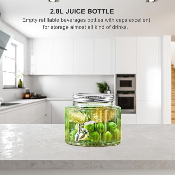 Vanndispenser i glass med tappekran for fruktte og drikkedispensering under uformell underholdning