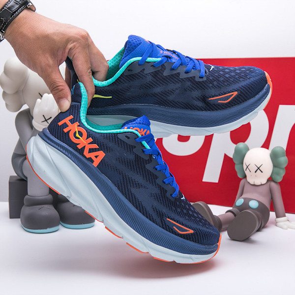 Clifton 9 Textil Dam Herr Skor Löparskor Sneakers mörkblå blå 45