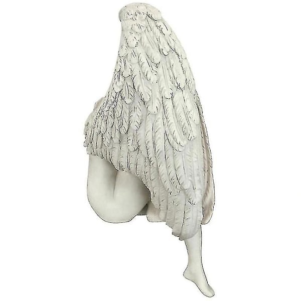 Den sørgende engelen langvinget sittende statue trist engelfigur minnesmerke kirkegårdsstatuer gråtende engel_l25