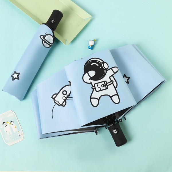 Sammenleggbar reiseparaply for barn, manuell åpning og lukking, vindtett og regntett, tegneseriehvit astronautdesign