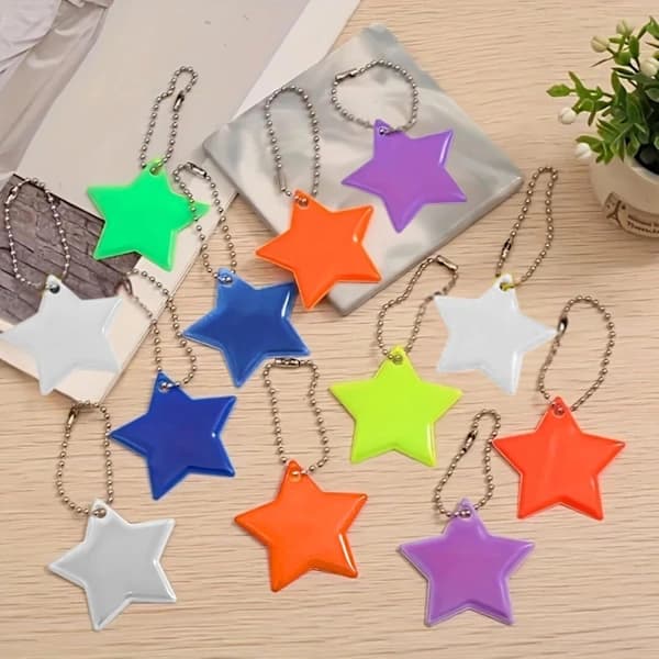 24 pcs. reflective pendants - star-shaped keychain reflectors, safety equipment for backpack, school bag, bicycle and stroller