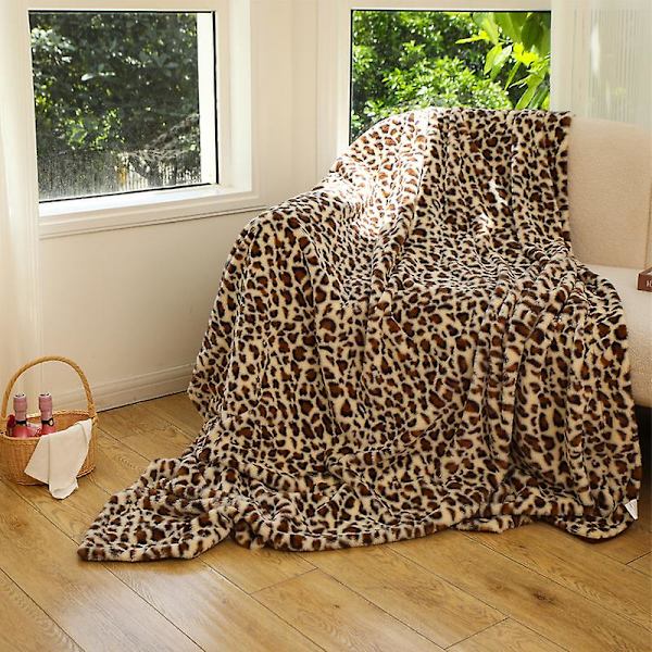 Kunstpels sengedækken i print. Vendbar blød og fluffy fleece