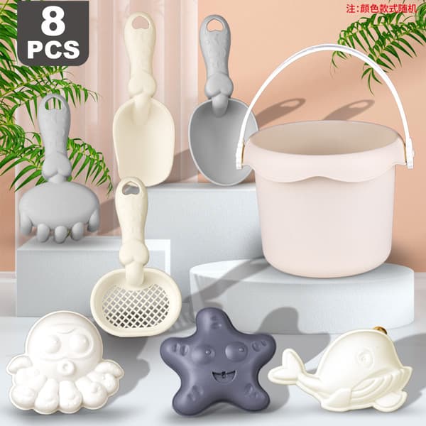 Barnstrandleksaksset, sandgrävning, vattenlek, utomhus
