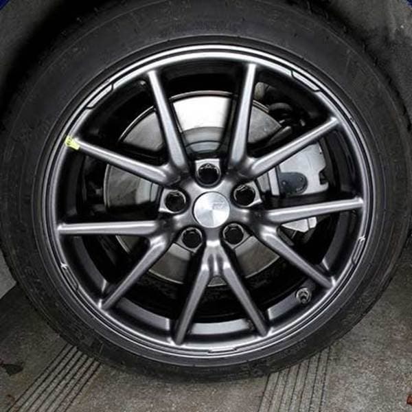 4-pak - Tesla hjulkapsler / hjulnavsemblemer Black/red