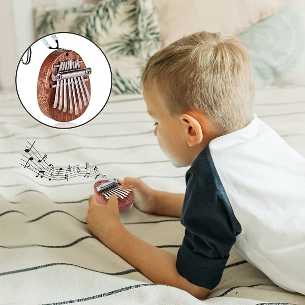 Tommelfingerklaver, mini tommelfingerklaver sød bærbar finger kalimba med 8 tangenter til børn