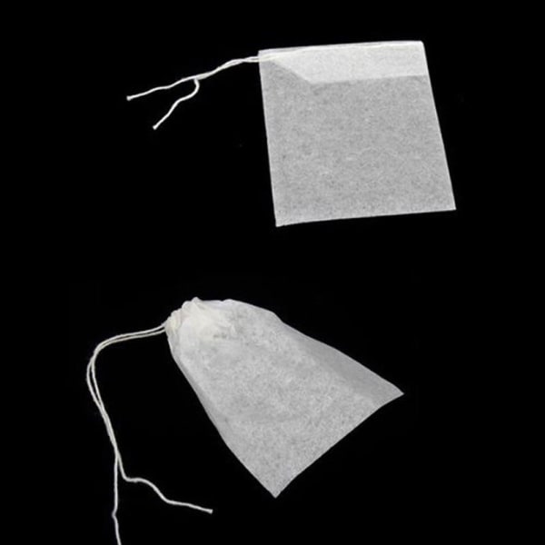 100/200/300 stk tomme teposer løse urter engangstrekkbar tepose bærbar 5,5x7cm 200stk 300pcs