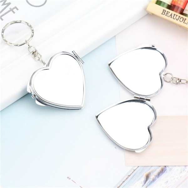 Sminkspegel i metall Liten rund spegel RUNDAD RUNDAD Rounded Rounded