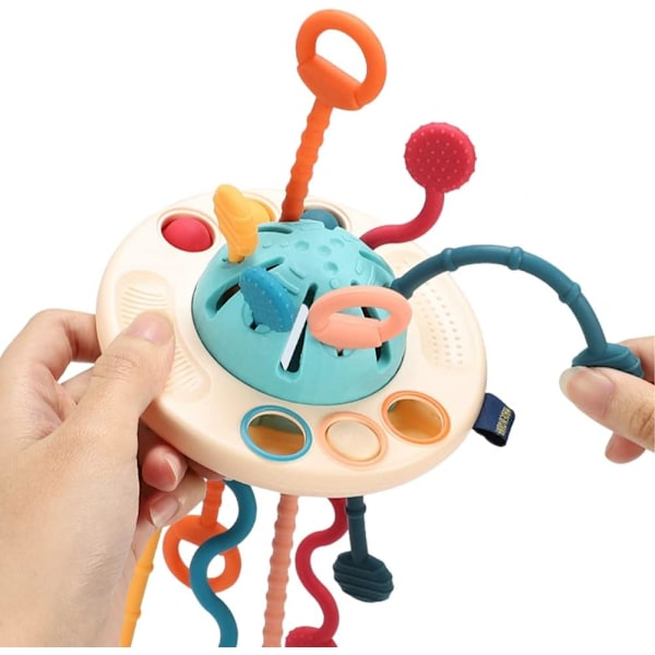 Baby silikon dragsko interaktiv leksak Montesso