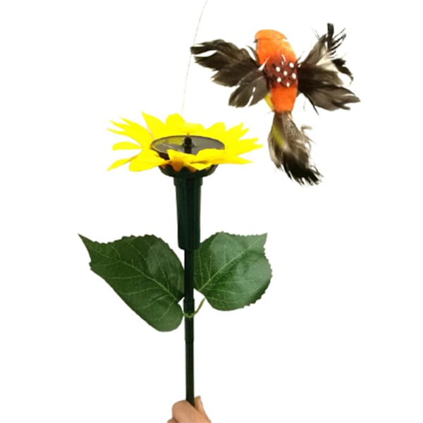 Aurinkovoimalla toimivat tanssivat perhoset, lepattavat lentävät kolibrit, puutarhakasvit, kukat, seiväs, nurmikon koristelu Ora Orange Sun Flower Hummingbird