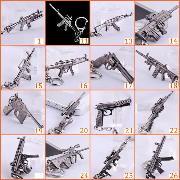 Uutuus Counter Strike Pistooli Ak47 Avainrengas Miehille Koriste Awp Kivääri Tarkka-ampuja Cs Go Saber Miesten Laukku Auton Avainrengas Korut Muistoesineet 19
