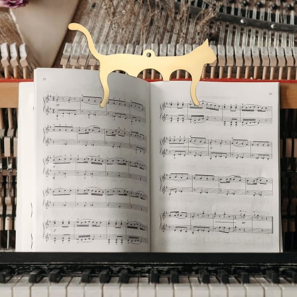 (kulta) 1-osainen metallimusiikkiteline kissan muotoinen musiikkitelineteline ulkokäyttöön kirjateline Piano-kitara viulu-näppäimistökirja
