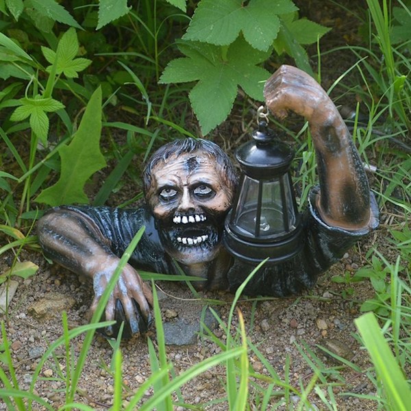 Stjerne Halloween-dekorasjon: Zombi-larve med LED-lykt, Zombi-statue som holder lampe.