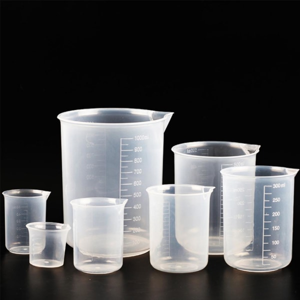 Transparent plastic cup with graduated kitchen baking