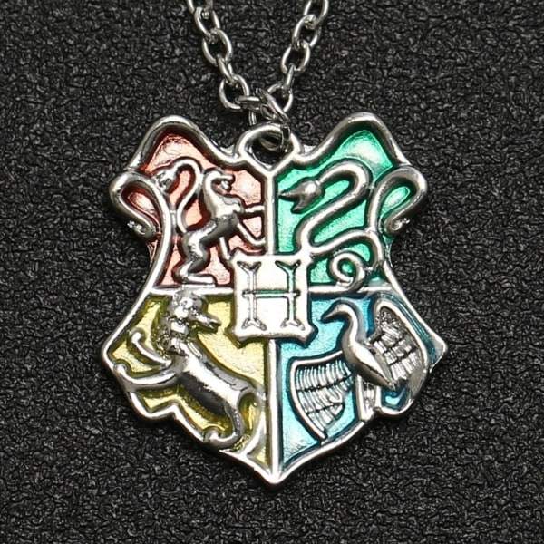 Harry Potter -kaulakoru - Tylypahkan vaakuna/kilpi/tunnus hopea - WELLNGS