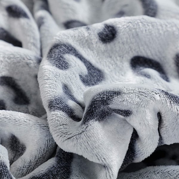 Uragiri flanell fleece filt, lätt supermjuk, mysig plysch sängfilt, 60 × 80 tum, svart leopard