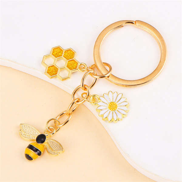 Trendiga e Metal Emalj Bee Honey Daisy Flower Charms Nyckelringar A3