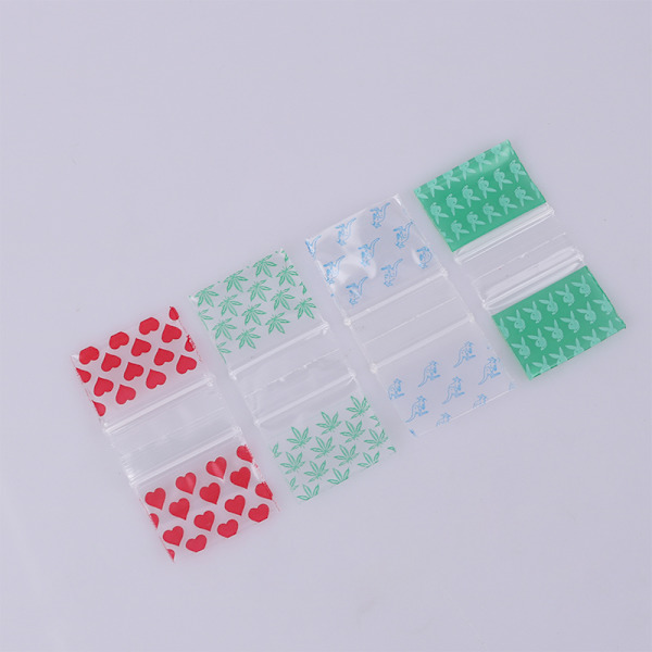 100 st Små dragkedjepåsar Cartoon Pattern Portable Storage Pou 3.8*4.5cm 100pcs