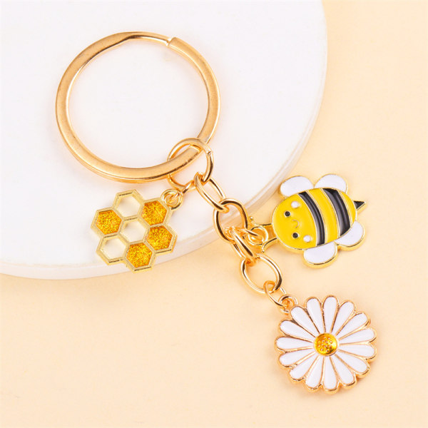 Trendiga e Metal Emalj Bee Honey Daisy Flower Charms Nyckelringar A3