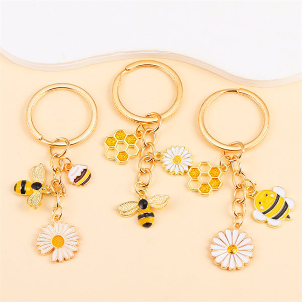 Trendiga e Metal Emalj Bee Honey Daisy Flower Charms Nyckelringar A2