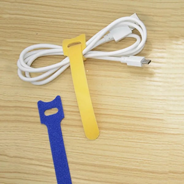 100 kappaletta Velcro-datakaapelin säilytyssolkia kuulokkeille wi
