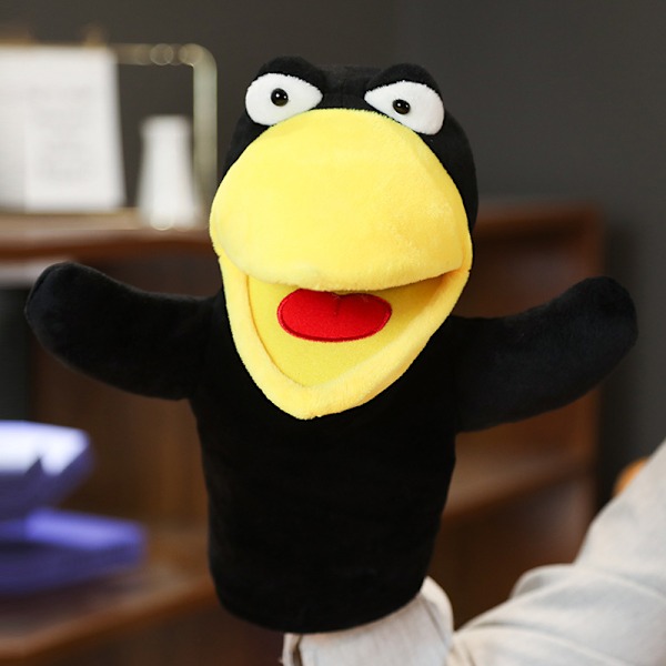 Femfingerdocka, en kråkhanddocka med rörlig mun, en p