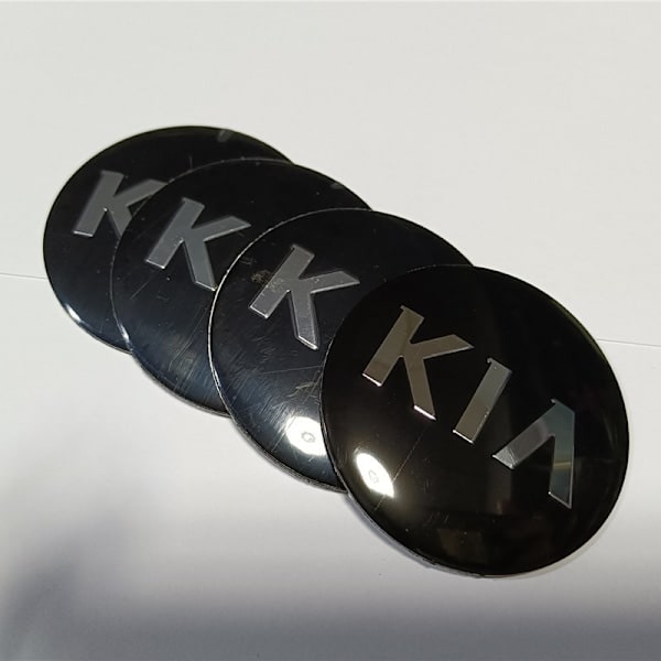 Sæt med 4 sorte 60 mm hjulcenterkapsler til Kia