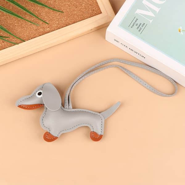 1. mænds bil gravhund nøglering PU læder hund nøgleringe mode Light gray
