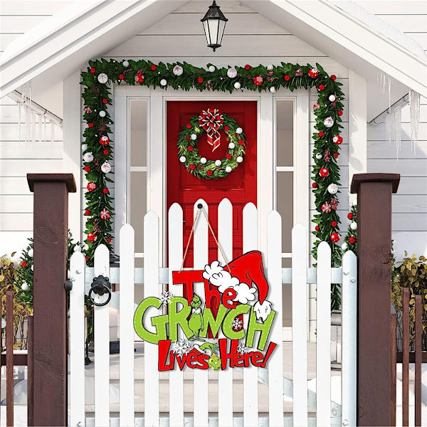 Puinen joulukuusenkoriste - TÄÄLLÄ ASUU GRINCH