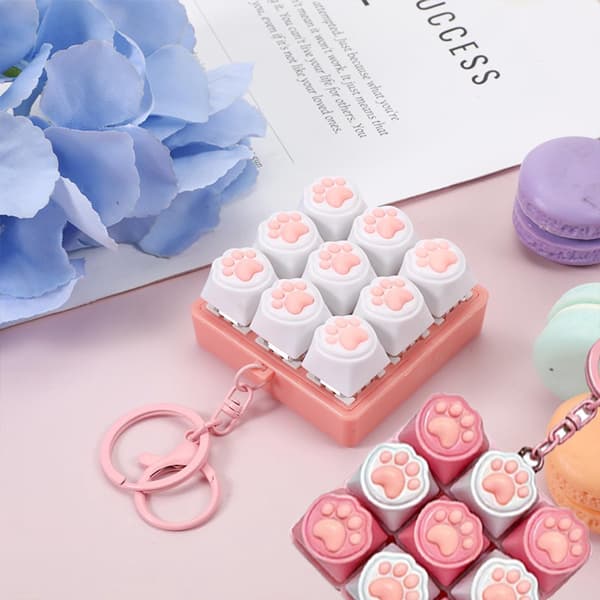 Tangentbordsfidgetleksak 2-pack 9 silikonknappar med kattassar, sensorisk stresslindring 6x6x3cm