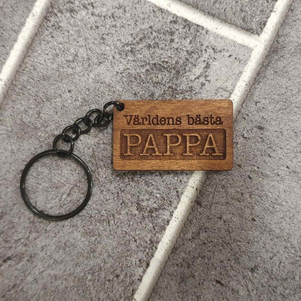 Nyckelring  "Världens bästa pappa" i trä. Fars dag