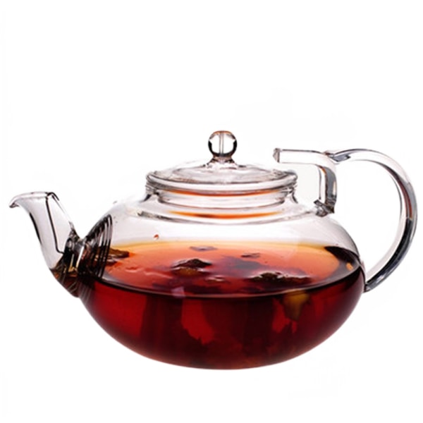 Blommande te, lösa blad tekanna med glassil Säker