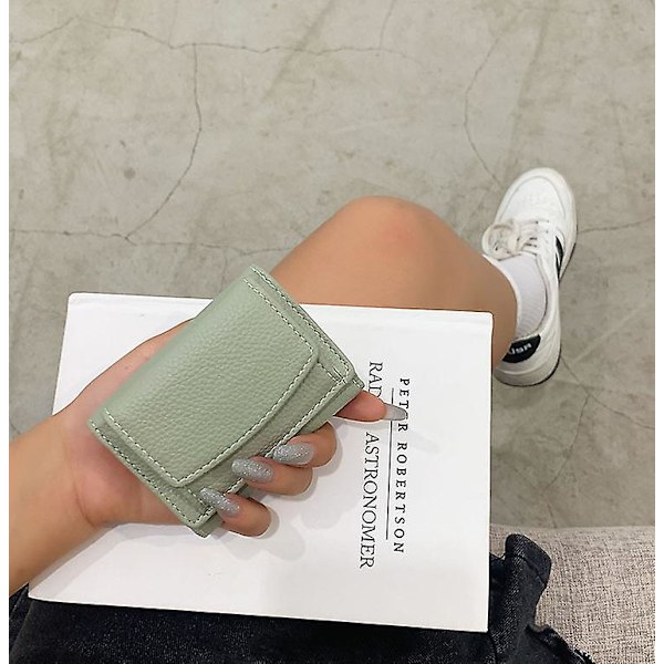 Uusi unisex-luottokorttipetoksilta suojaava taittuva minilompakko