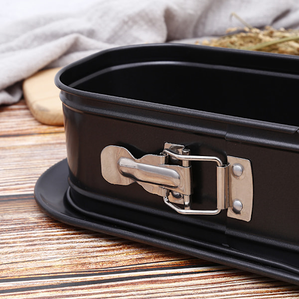 Svart springform i rustfritt stål med non-stick belegg, 31,5 * 12,5 * 8,5 cm holder maten frisk og for oppbevaring