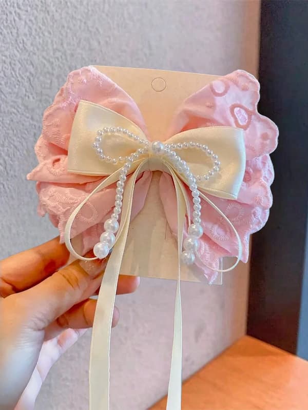Flickhårklämma med rosett, spets och pärldetaljer Pink