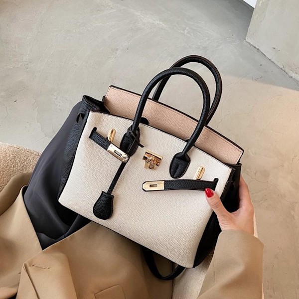 Stilful Sort Tote Taske til Kvinder Rummelig Design med Elegante Sølvdetaljer Black