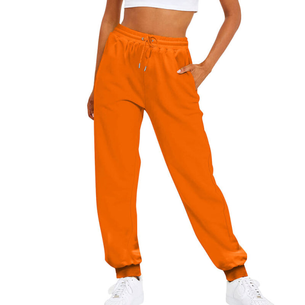 Damer med elastiska midja långbyxor Solida Basic Leggings Orange M