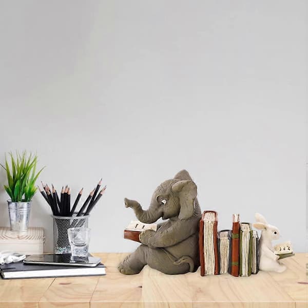 Statue af elefant og kanin, der læser i harpiks, indendørs og udendørs
