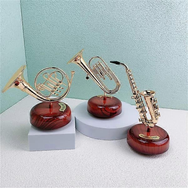 Spilledåse klassisk saxofon fransk statue retro håndsvinget mu