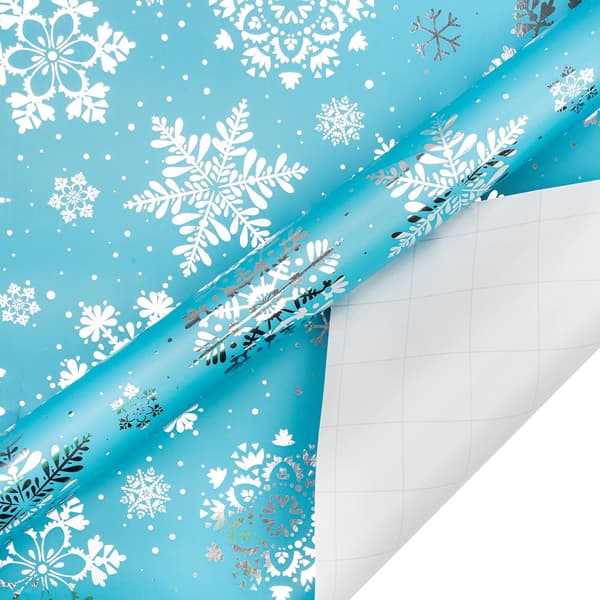 Julklappspapper - himmelsblå renar, snöflinga, silverprick