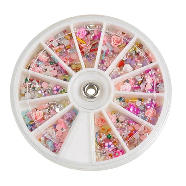 1200 stk. blandede blomster, sløyfer, neglekunsttips, glitter, skivedekorasjon, manikyr