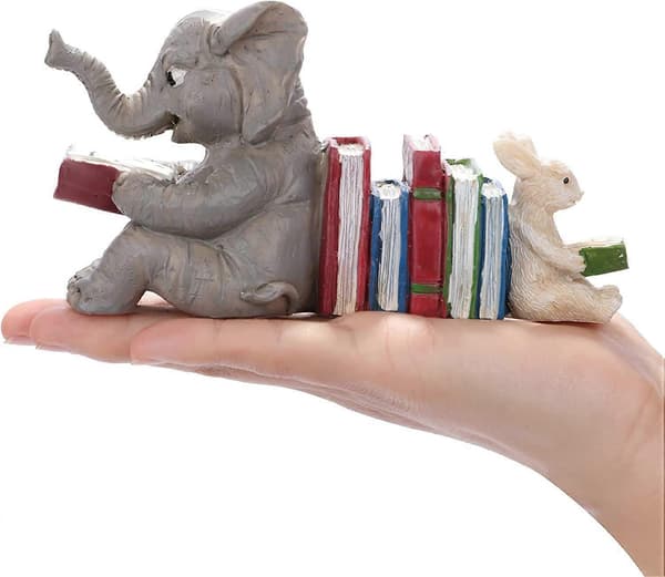 Statue af elefant og kanin, der læser i harpiks, indendørs og udendørs