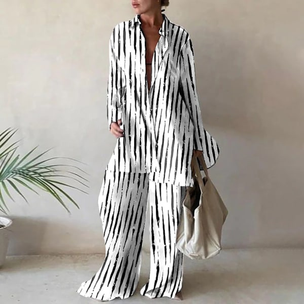 Naisten toppi ja housut kaksiosaisena, höyryhihainen paita ja löysät housut päivittäiseen rutiiniin töissä stripe l