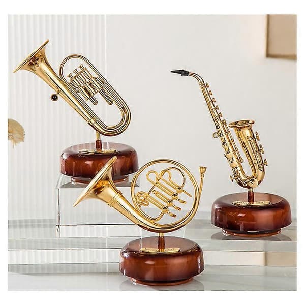 Spilledåse klassisk saxofon fransk statue retro håndsvinget mu