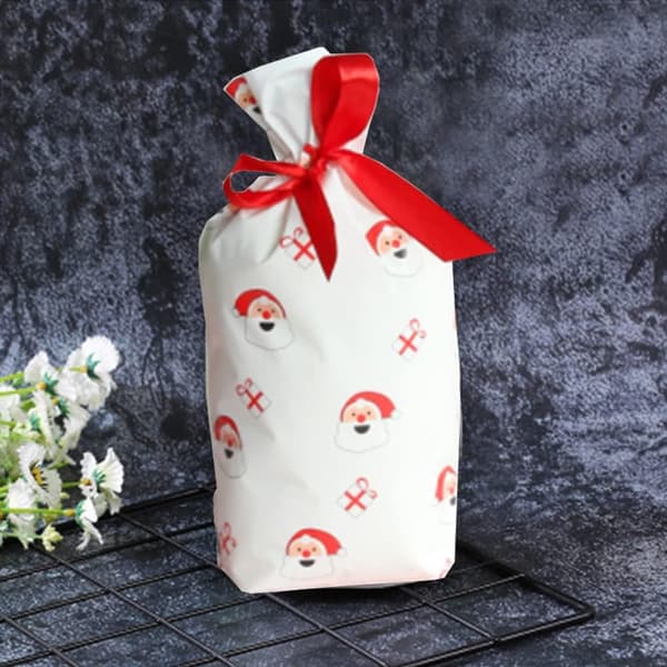 Paket med 50 presentpåsar med dragsko, julgodispåsar（Jultomten）
