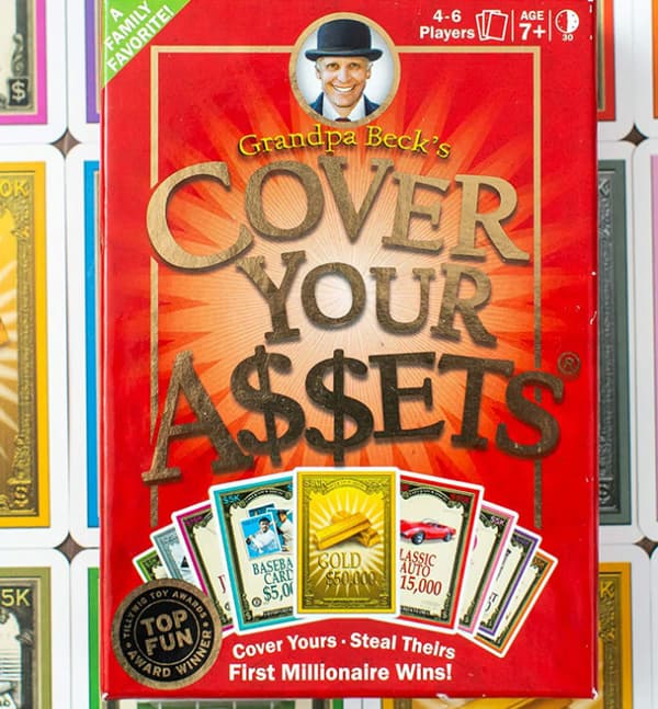 Cover Your Assets -juhlapelikorttilelu