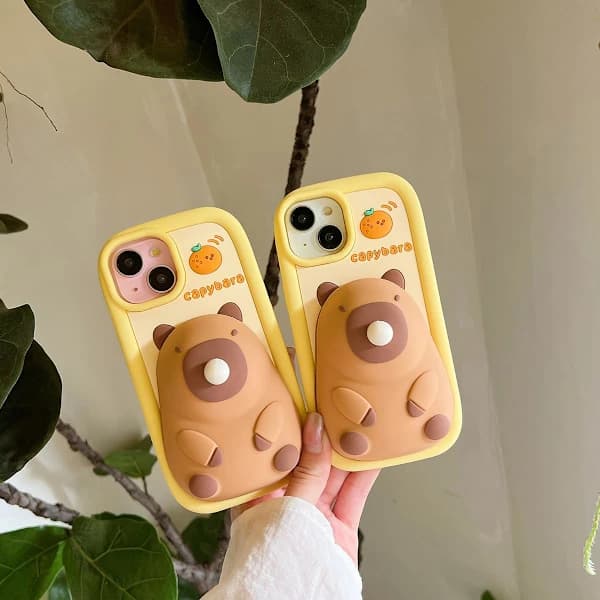 A cute 3D kawaii iPhone case with a fun bubble capybara pattern, cartoon design and keychain, AB