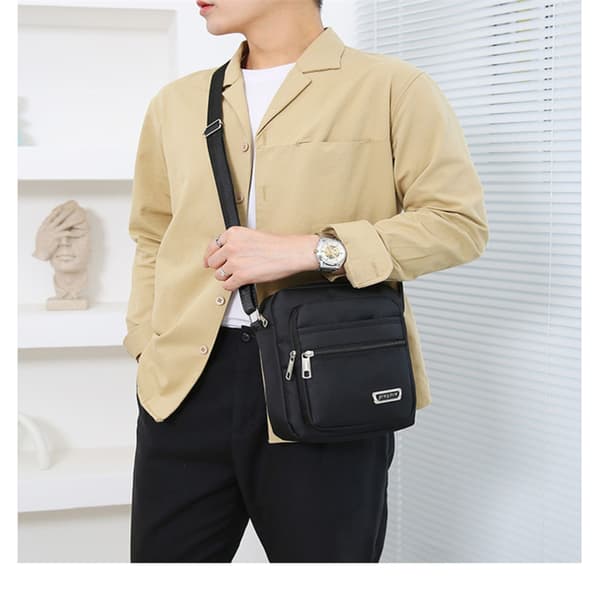Crossbody-veske i nylon for menn fire glidelåser